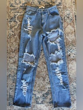 Stretchy Distressed High-Rise Women’s Jeans in Medium Blue